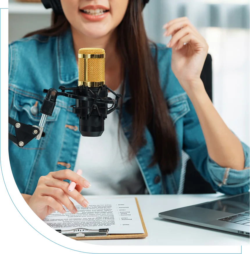 Woman recording a video with a smartphone on a handheld stabilizer.